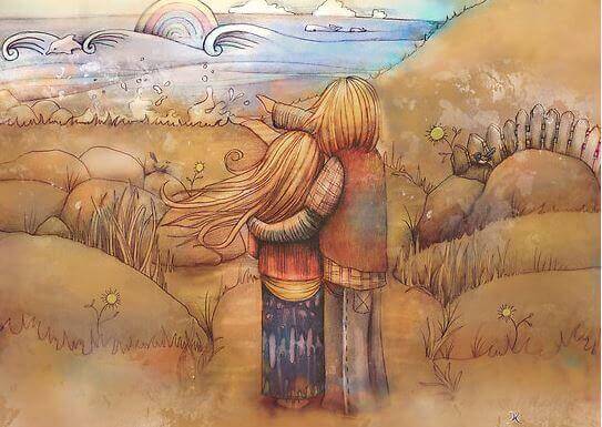 kumsalda manzarayı izleyen çift