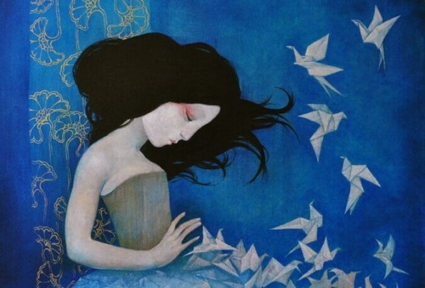 origami kuşlar yapan kız