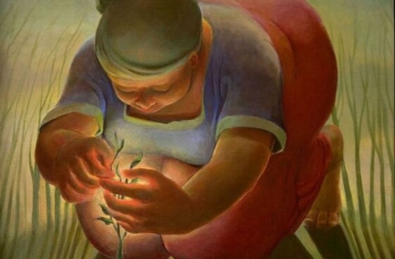 Nazikçe bitki diken bir kadın