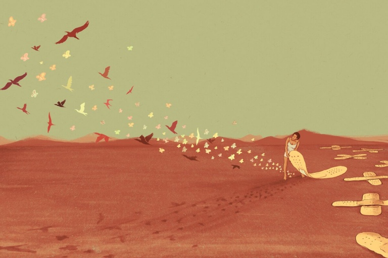 çölde kelebekleri serbest bırakan kadın