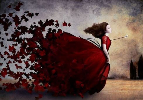 kırmızı elbiseli kadın sonbahara karışıyor