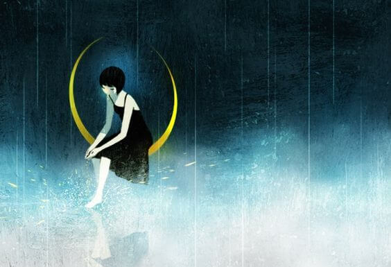 ayda oturan üzgün kadın