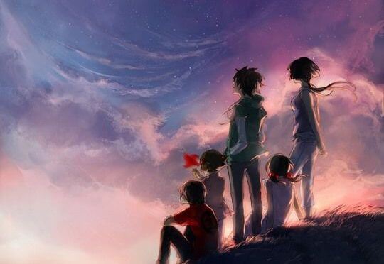 güneşin batışını izleyen aile