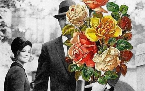 renkli dev buket çiçek taşıyan adam