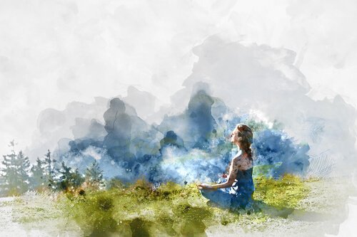 kadın doğada meditasyon yapıyor