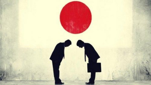 japon bayrağı altında iki kişi