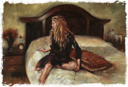 yatakta oturan kadın