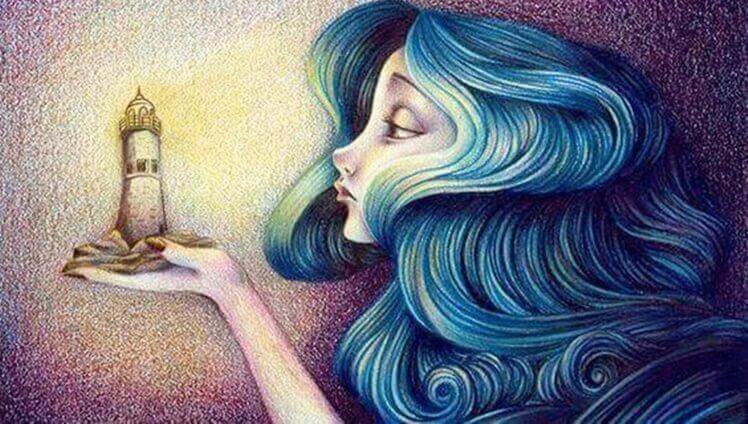 kadın deniz fenerine bakıyor