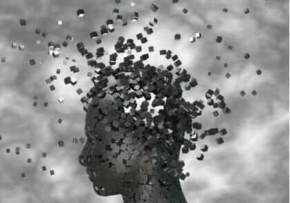 Siyah karelere dönüşen insan profili.